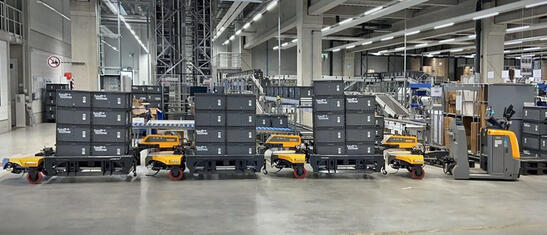 Load train Industry Train FT510 with Jungheinrich tractor EZS 350